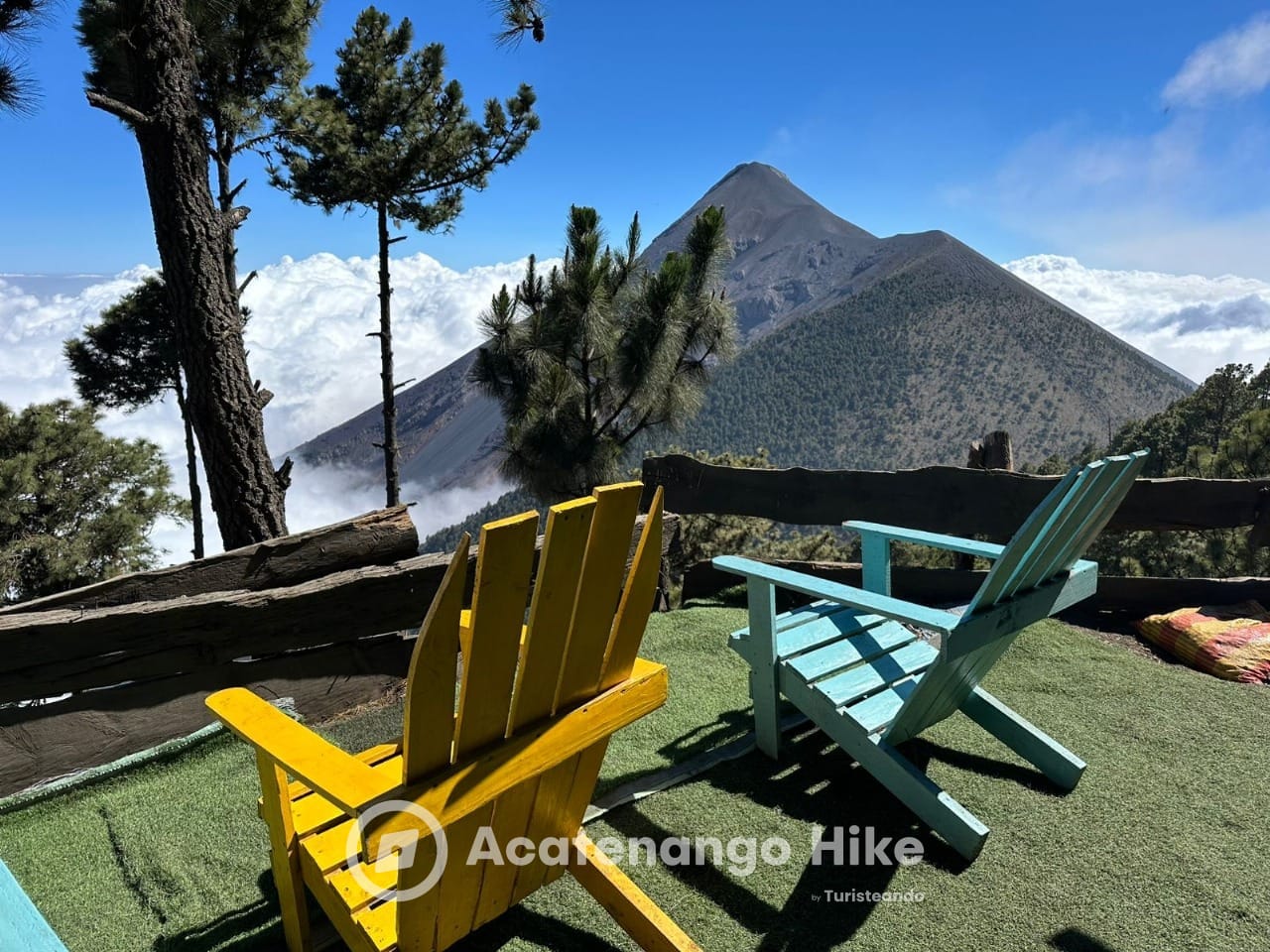 Volcán de Fuego seen from the base camp with Adirondack chairs